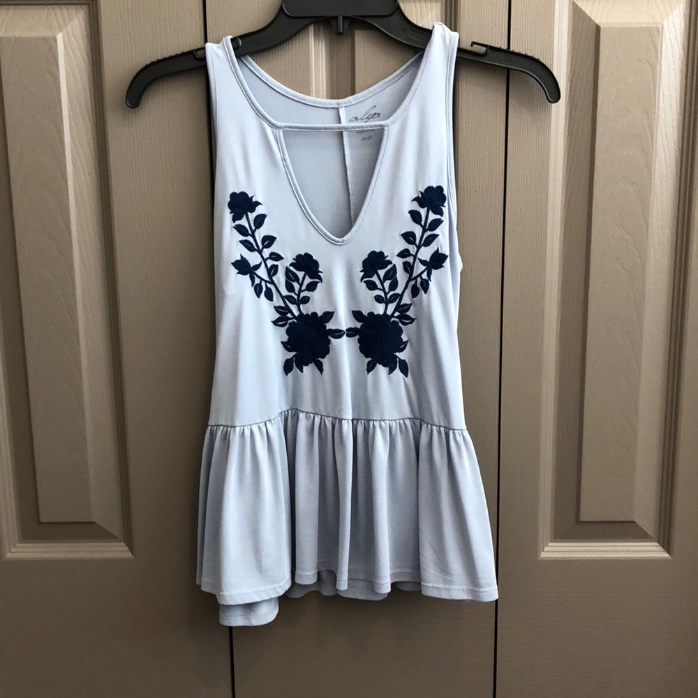 Francesca’s blue tank